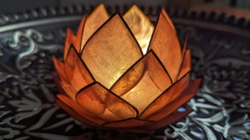 Lotus flower candle holder in a bowl