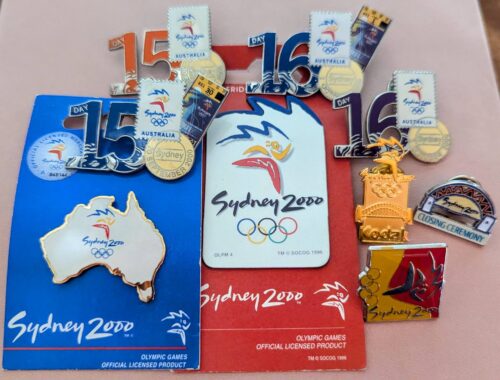 A collection of pins and magnets from the Sydney Olympics in 2000