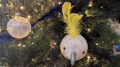 Christmas tree & baubles including a cockatoo head with yellow feathers