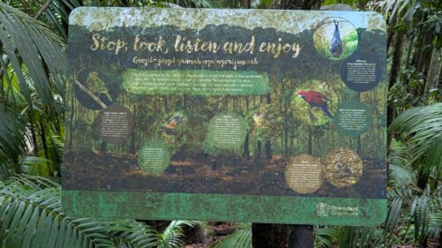Forest sign that says 'Stop,look, listen and enjoy