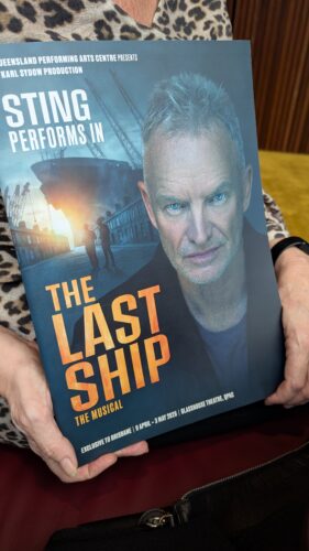 Person holding program from The Last Ship
