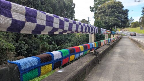 Bridge rails wrapped in home-made blankets